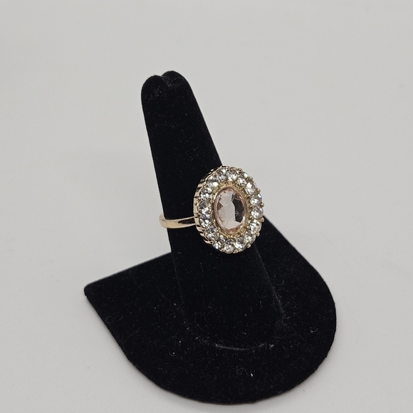 gold tone cocktail ring with large pink rhinestone and clear halo size 7 - Picture 1 of 5
